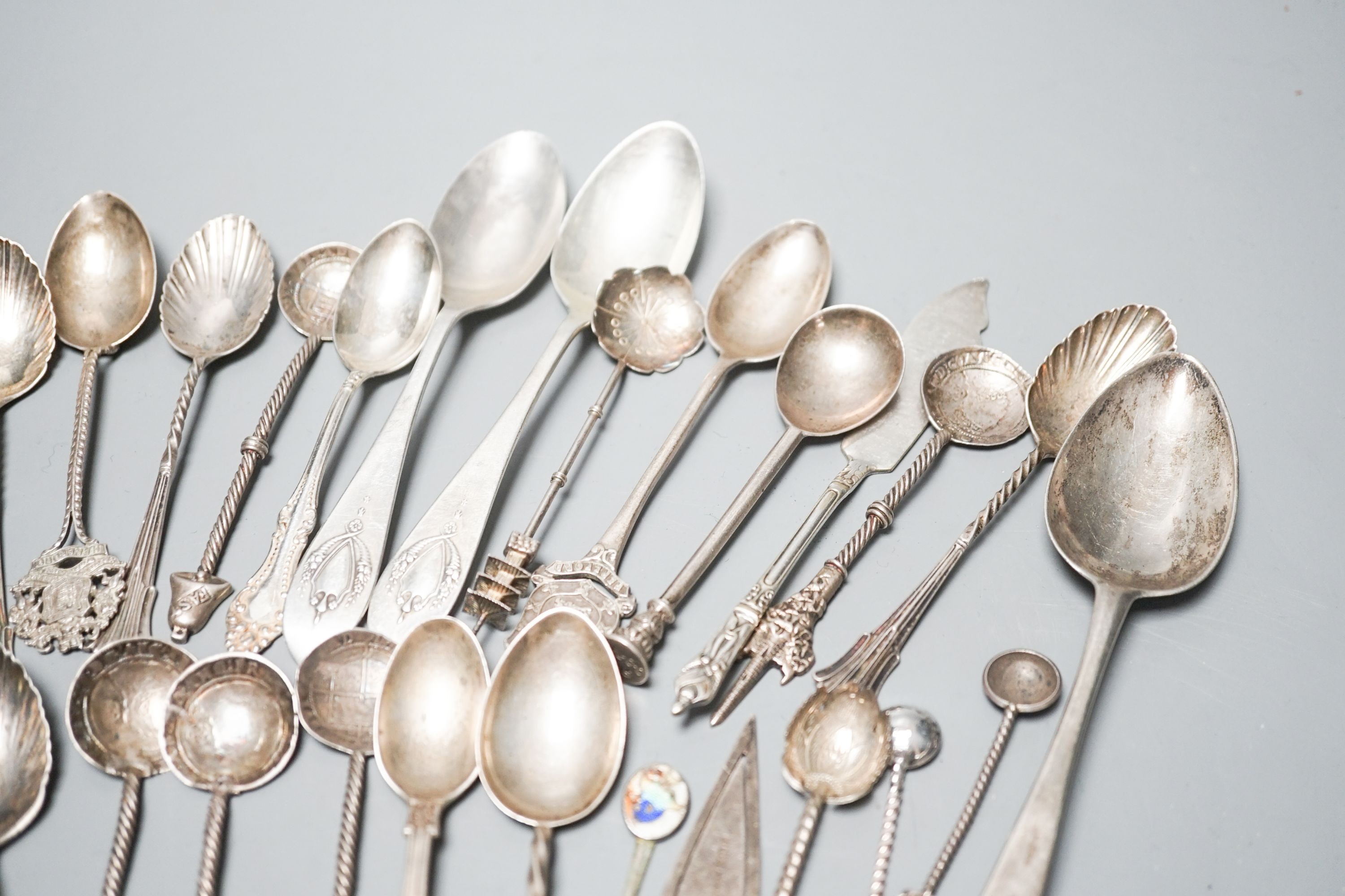 A group of assorted mainly silver and white metal minor flatware and a silver bookmark.